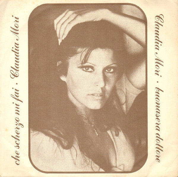 Claudia Mori : Che Scherzo Mi Fai / Buonasera Dottore (7", Single)