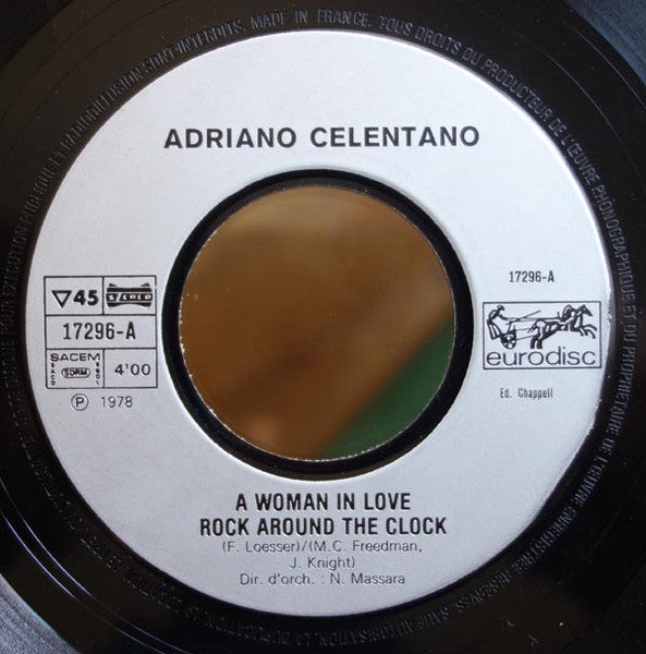 Adriano Celentano : Woman In Love - Rock Around The Clock / Preghero (7", Single)